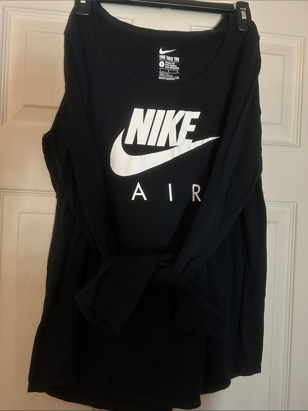 Women’s black long sleeve “The Nike Tee” EUC in size Large